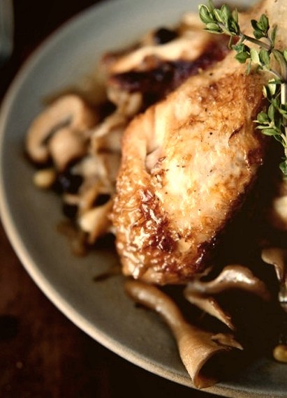 Braised Chicken With Mushrooms, Pine Nuts + Dried CurrantsSource